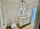 Bright bathroom featuring a double sink vanity with granite countertops and modern lighting at 8362 Jasmine St, Commerce City, CO 80022