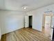 Spacious bedroom with wood flooring, closet and neutral color palette at 8362 Jasmine St, Commerce City, CO 80022