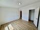Bright bedroom features wood flooring and closet at 8362 Jasmine St, Commerce City, CO 80022