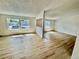 Bright and airy living room with lots of natural light and wood flooring at 8362 Jasmine St, Commerce City, CO 80022