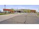 Modern building exterior featuring a mix of brick and siding with inviting entrance at 10007 Martin Luther King Blvd # 104, Denver, CO 80238