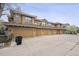 View of multiple attached garages providing ample parking space, set in a well-kept community at 10007 Martin Luther King Blvd # 104, Denver, CO 80238