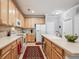 Bright kitchen featuring a breakfast bar, updated appliances, and plenty of counter space at 10007 Martin Luther King Blvd # 104, Denver, CO 80238