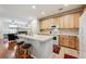 Bright kitchen featuring a breakfast bar, updated appliances, and plenty of counter space at 10007 Martin Luther King Blvd # 104, Denver, CO 80238