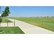 Scenic view of a walking path through a lush green field, great for outdoor activities at 10007 Martin Luther King Blvd # 104, Denver, CO 80238