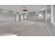 Expansive bonus room with neutral walls, recessed lighting, a ceiling fan and multiple windows at 1012 S Addison Way, Aurora, CO 80018