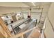 This garage features a professional car lift and plenty of workspace at 1012 S Addison Way, Aurora, CO 80018