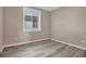 Bedroom showcasing neutral paint and light-filled window view at 1171 Nathan Pl, Erie, CO 80026