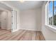 Bright room with natural light from window, and an adjacent door for easy access to other areas at 1171 Nathan Pl, Erie, CO 80026