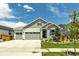 Charming single-Gathering home with a well-maintained lawn, a three-car garage, and manicured landscaping at 1171 Nathan Pl, Erie, CO 80026