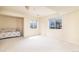Finished basement area featuring neutral decor, carpet, and natural light from basement windows at 6271 S Billings Way, Centennial, CO 80111