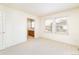 Bright bedroom with carpet flooring, and two windows to allow lots of natural light at 6271 S Billings Way, Centennial, CO 80111