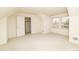 A sunny bedroom with carpet flooring, windows, and a walk-in closet at 6271 S Billings Way, Centennial, CO 80111