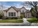 Lovely home with well-maintained landscaping, stone accents, and inviting walkway at 6271 S Billings Way, Centennial, CO 80111