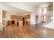 Open concept kitchen featuring wooden cabinets, large island, and hardwood floors at 6271 S Billings Way, Centennial, CO 80111