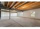 Unfinished basement featuring concrete floor, visible beams and support and roughed-in plumbing at 3327 Backdrop Ct, Castle Rock, CO 80108