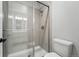 Modern bathroom features a glass enclosed shower with chrome fixtures at 3327 Backdrop Ct, Castle Rock, CO 80108