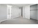Spacious bedroom with neutral walls, plush carpet, closet, and ensuite bathroom at 3327 Backdrop Ct, Castle Rock, CO 80108