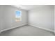 Bright bedroom featuring plush carpeting and a window with scenic outdoor views at 3327 Backdrop Ct, Castle Rock, CO 80108
