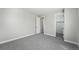 Bedroom featuring neutral walls, plush carpet, and ensuite bathroom at 3327 Backdrop Ct, Castle Rock, CO 80108