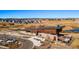 Attractive community center with modern architectural elements, parking, walking path, and desert landscape at 3327 Backdrop Ct, Castle Rock, CO 80108