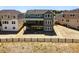 Back exterior of home featuring deck, staircase and fenced-in yard at 3327 Backdrop Ct, Castle Rock, CO 80108