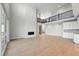 Spacious, open-concept living space with high ceilings and hardwood floors. Balcony overlooks the room at 3327 Backdrop Ct, Castle Rock, CO 80108