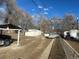 View of the backyard showing detached storage shed and gravel ground cover at 410 Baker St, Longmont, CO 80501