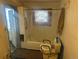 The bathroom features a tub and shower and basic fixtures at 410 Baker St, Longmont, CO 80501