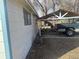 View of the side yard with a carport at 410 Baker St, Longmont, CO 80501