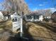 Front exterior of a home, featuring a 'For Sale' sign in the yard at 410 Baker St, Longmont, CO 80501