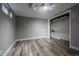 Basement bedroom with vinyl flooring, small window, recessed lights, and closet space at 3200 W Chenango Ave, Englewood, CO 80110