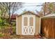 Backyard storage shed with double doors at 3200 W Chenango Ave, Englewood, CO 80110