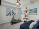 Bedroom with exercise equipment, soft carpeting, and tasteful decor at 4525 N Raleigh St, Denver, CO 80212
