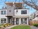 Modern two-story home showcasing clean lines, a rooftop deck, and manicured front lawn at 4525 N Raleigh St, Denver, CO 80212