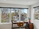 Bright office space with large windows offering a view of the neighborhood at 4525 N Raleigh St, Denver, CO 80212