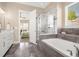 Bathroom featuring soaking tub, shower, and vanity; adjacent to main bedroom at 3309 Thornwood Ct, Castle Rock, CO 80108