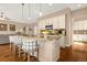 Bright kitchen with granite counters, pendant lighting, stainless appliances, and breakfast bar with seating at 3309 Thornwood Ct, Castle Rock, CO 80108
