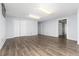 Spacious finished basement featuring vinyl flooring and ample lighting from fluorescent fixtures at 6851 S Franklin St, Centennial, CO 80122