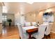 Stylish dining room connected to the entryway, offering hardwood floors and neutral tones at 6851 S Franklin St, Centennial, CO 80122