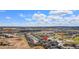 Overhead view of the neighborhood, showcasing the community pool, school and surrounding homes, with address pin at 11235 S Neu Towne Cir, Parker, CO 80134