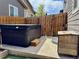 Backyard featuring a hot tub, perfect for relaxation and enjoying the outdoors at 11235 S Neu Towne Cir, Parker, CO 80134