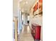 Inviting hallway with hardwood floors and decorative accents at 11235 S Neu Towne Cir, Parker, CO 80134