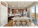 Stylish kitchen with modern island, stainless steel appliances, and abundant cabinet space at 11235 S Neu Towne Cir, Parker, CO 80134
