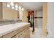 Bright bathroom features modern vanity, new fixtures, and beautiful subway tile at 7245 Prairie Cir, Longmont, CO 80504