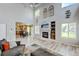 Bright open-concept living area with fireplace and kitchen views at 7245 Prairie Cir, Longmont, CO 80504