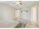 Spacious main bedroom with vaulted ceiling, ceiling fan, and ensuite bathroom at 7245 Prairie Cir, Longmont, CO 80504