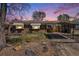 Charming single-story brick home with a covered carport and landscaped front yard at 2064 Ironton St, Aurora, CO 80010