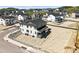 Back aerial view of the home and surrounding community at 1733 Fox Trotter Pt, Castle Rock, CO 80104