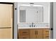 Bathroom featuring modern vanity, decorative backsplash and modern lighting at 3930 S Spruce St, Denver, CO 80237